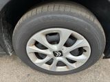 a close up of a tire on a car ' s rim