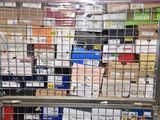 a metal cage with a bunch of boxes in it