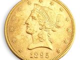 l'image d'une pièce d'or sur laquelle figure une tête de femme