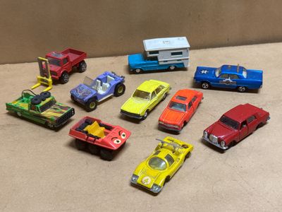 a lot of toy cars that are sitting on the floor
