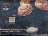 three parachutes that are being flown over the water