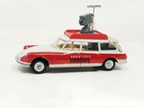 a red and white toy car with a camera on top of it