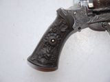 a gun that is sitting on a table