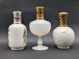 three vases sitting next to each other on a table