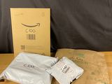 two bags of coffee sitting on a table next to a bag of coffee