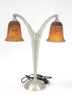 pair of art deco table lamps in the form of a three - light table lamp