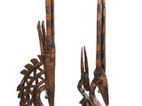paire de sculptures africaines en bois représentant un oiseau et un poisson