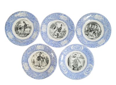 four blue and white plates with pictures of people on them