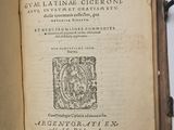 an open book with a picture of a lion on it
