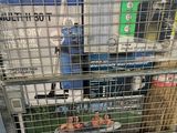 a metal cage with a picture of a couple of people in it