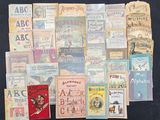 a lot of books that are sitting on a table