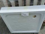 a white box that has some kind of item on it