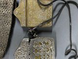a lot of silver items that are on a table