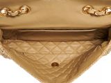 a close up of the inside of a beige purse