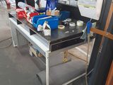 a picture of a workbench with a lot of tools on it