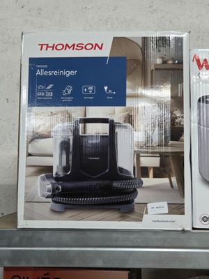two boxes of vacuum cleaners sitting on a shelf
