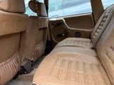 a car that has two seats in the back of it