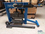 a picture of a blue work bench with a chain on it