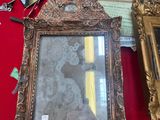 a picture of a woman in a picture frame on a chair