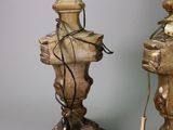 two vases that are sitting next to each other on a table