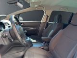 the interior of a car with two seats and a steering wheel