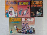 plusieurs livres pour enfants sont alignés sur une surface blanche
