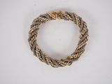 a gold and silver braid bracelet