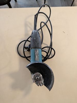 a small electric tool that is on a table