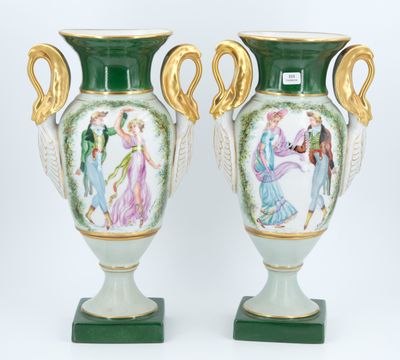 pair of green and gold vases with figures painted on them