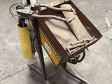 a cart with tools on top of it in a warehouse