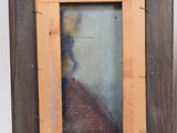 an old picture frame with a painting of a woman in a red dress