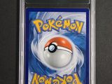 a close up of a pokemon card in a plastic case