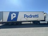 a semi truck that is parked in a parking lot