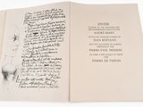 an open book with a drawing of a man ' s face on it