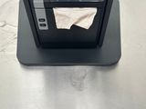 a small printer sitting on top of a metal table