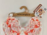 an image of a close up of a bralette on a hanger