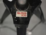 an image of a close up of a microscope on a tripod