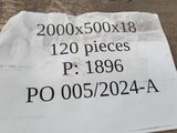 un bout de papier sur lequel est collée une étiquette de prix
