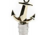 an anchor shaped bottle stopper with a metal base