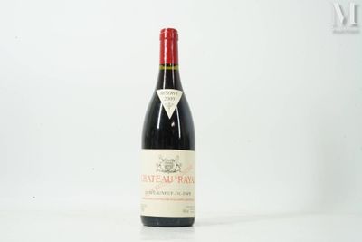 a bottle of wine that is sitting on a table