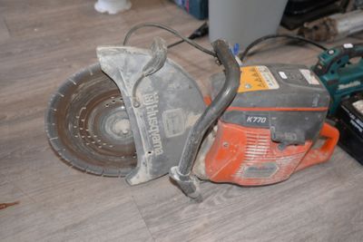 an image of a circular saw on the floor