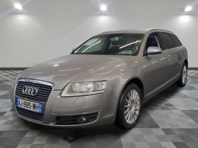 an image of a silver audi wagon parked in a garage