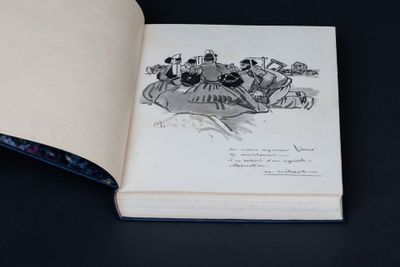 an open book with a drawing of a group of people on it