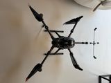a picture of a black and white photo of a camera and a drone
