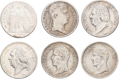six different types of silver coins on a white background