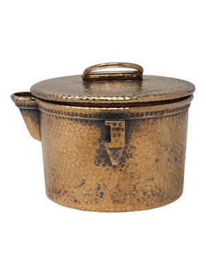 an image of a large copper pot with a lid on a white background