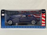 an image of a toy car in a box with an american flag on it