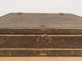 an old wooden box sitting on a table