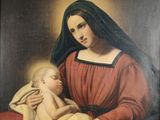 une peinture représentant une femme tenant un bébé sur ses genoux