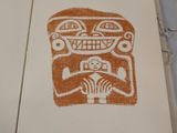 a picture of a book with a drawing of a face on it